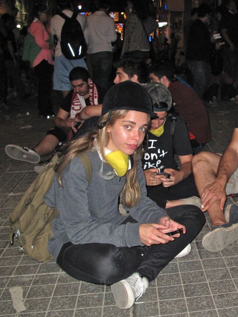This prortestor wore her riding cap to the demonstration - for all the left-wing party flags, most of the protestors seemed to be middle class folk.