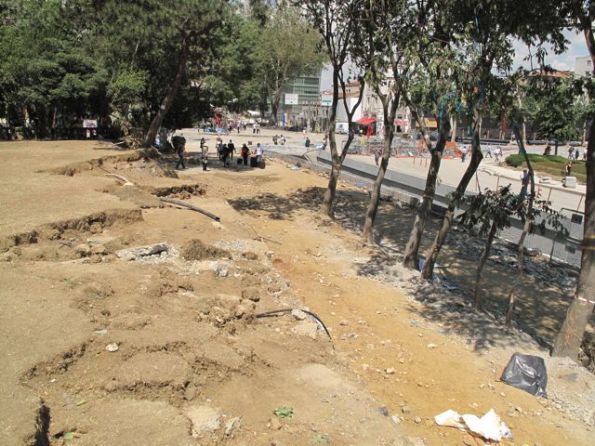 Where it all began - the corner of Gezi Park on Taksim Square, where an excavator's work on May 27 to clear space for a new pedestrian pavement brought a group of environmentalists to protest - and where, when police intervened by burning their tents and tear-gassing them, a national movement was born. (The plan to build a shopping mall on the park is real but was not actually why the trees here were going to be uprooted).