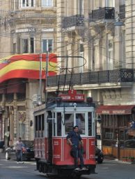 Tram passes by house